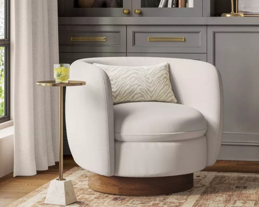 Upholstered Barrel Swivel Accent chair with Wood Base Cream -Threshold