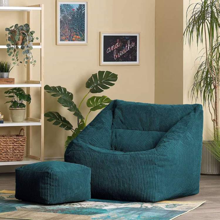 Morgan - Puf sillón con reposapiés cuadrado en pana azul pato